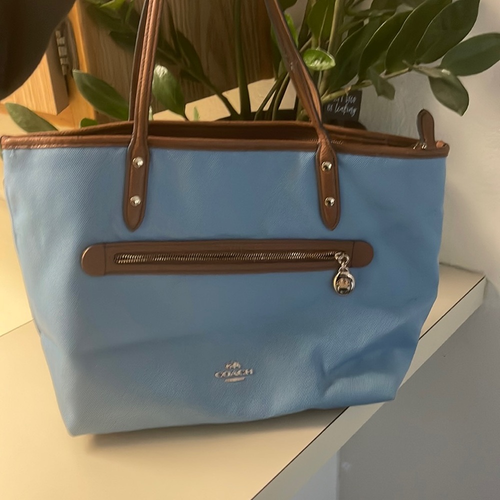Light blue and brown Coach purse